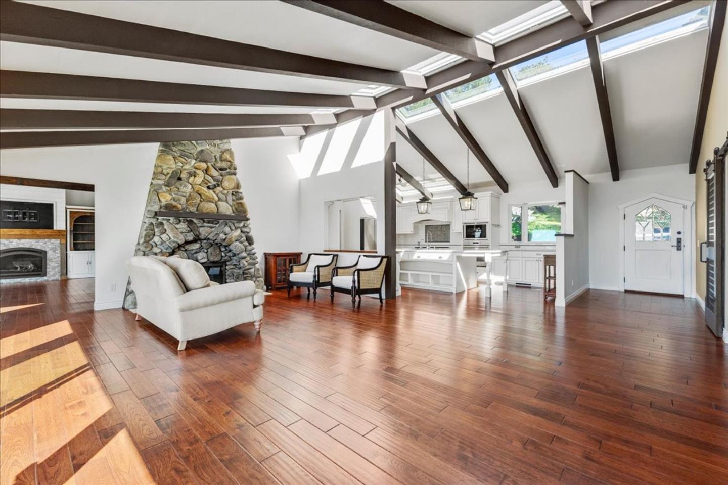 15 Mentone Road Carmel, CA 93923 - Photo 11 of 47 a living room with furniture and a large window