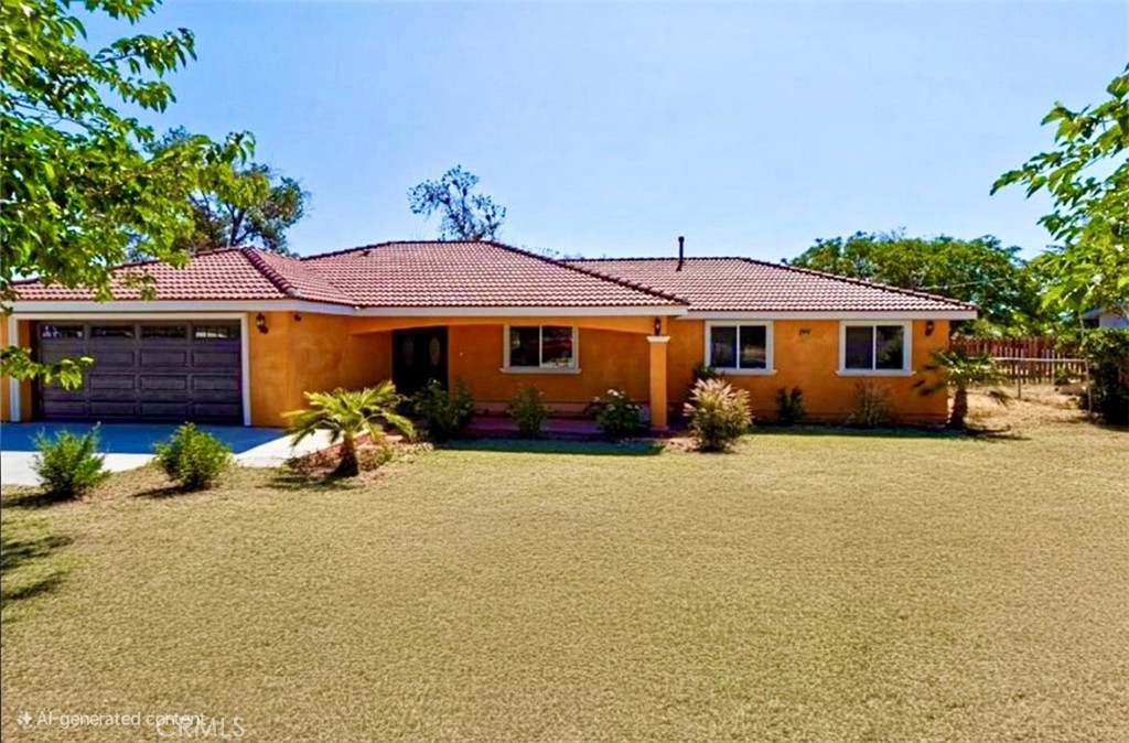 a view of a house with a yard and sitting area