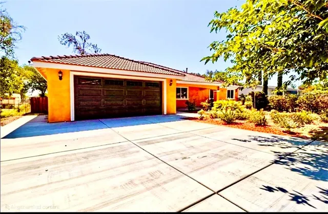 a front view of a house with a garage