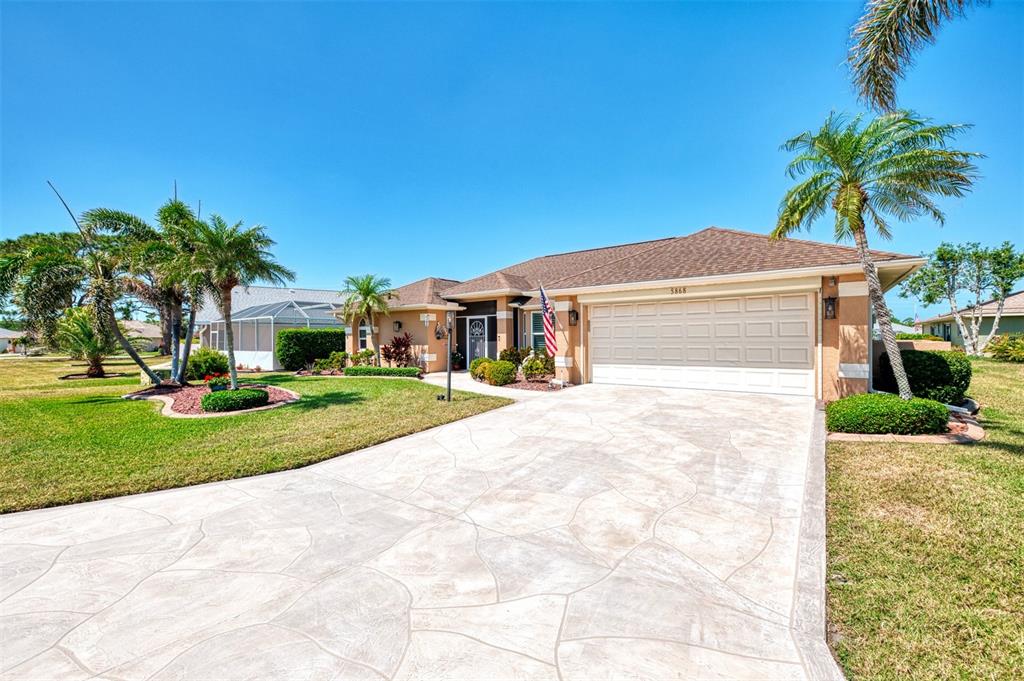 Decorative concrete driveway finish and E[pxy Garage Floor