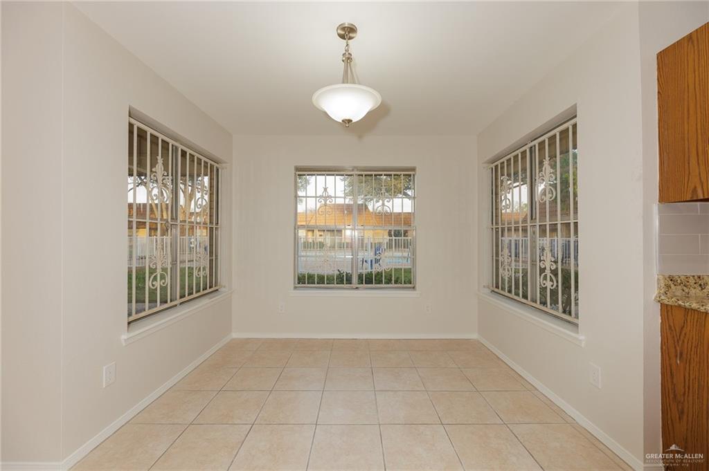 500 East El Rancho Avenue, Unit 26 McAllen, TX 78503 - Photo 11 of 27 a view of an empty room with windows