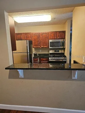 $220,000 | 2019 Dixie Belle Drive, Unit 2019O, Orlando, FL 32812