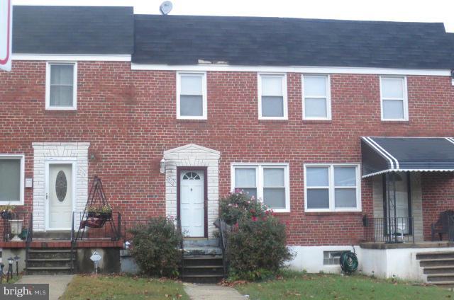 5506 Force Road Baltimore, MD 21206 - Photo 1 of 18 a front view of a house with garden