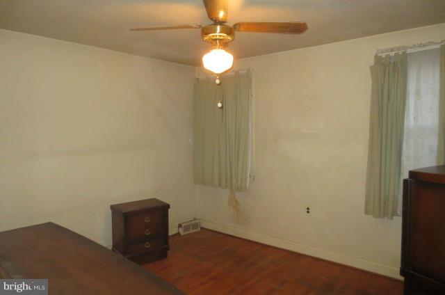 5506 Force Road Baltimore, MD 21206 - Photo 2 of 18 an empty room with closet and a chandelier fan