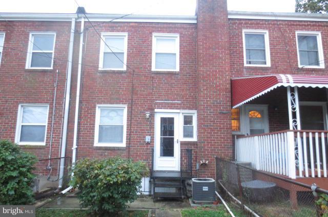 5506 Force Road Baltimore, MD 21206 - Photo 17 of 18 a front view of a building with garden