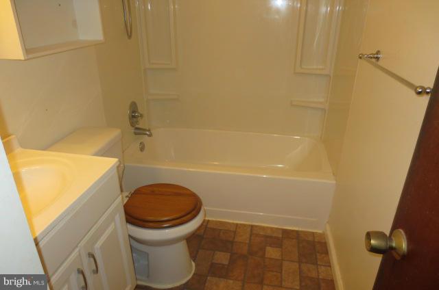5506 Force Road Baltimore, MD 21206 - Photo 3 of 18 a bathroom with a sink and a toilet