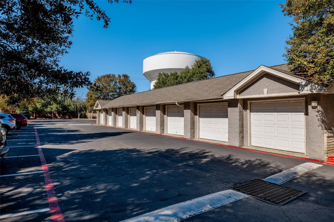 11908 Anderson Mill Road, Unit 1121 Austin, TX 78726 - Photo 9 of 24 View of garage