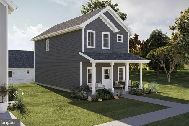 front view of a house with a yard