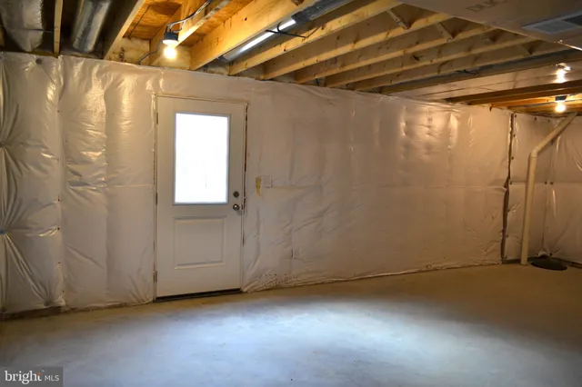 a view of a room with an empty space