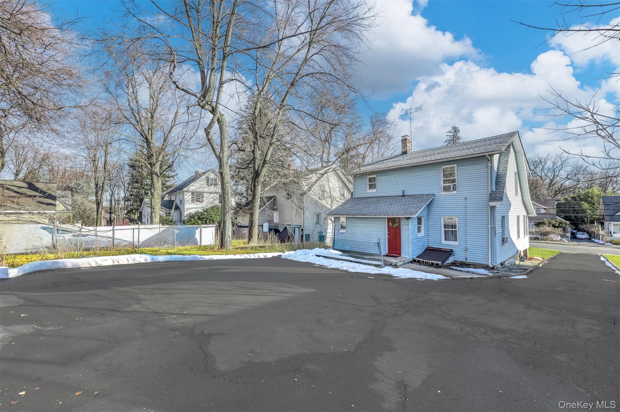 313 North Main Street Spring Valley, NY 10977 - Photo 2 of 19 View of front of home featuring a chimney and a residential view