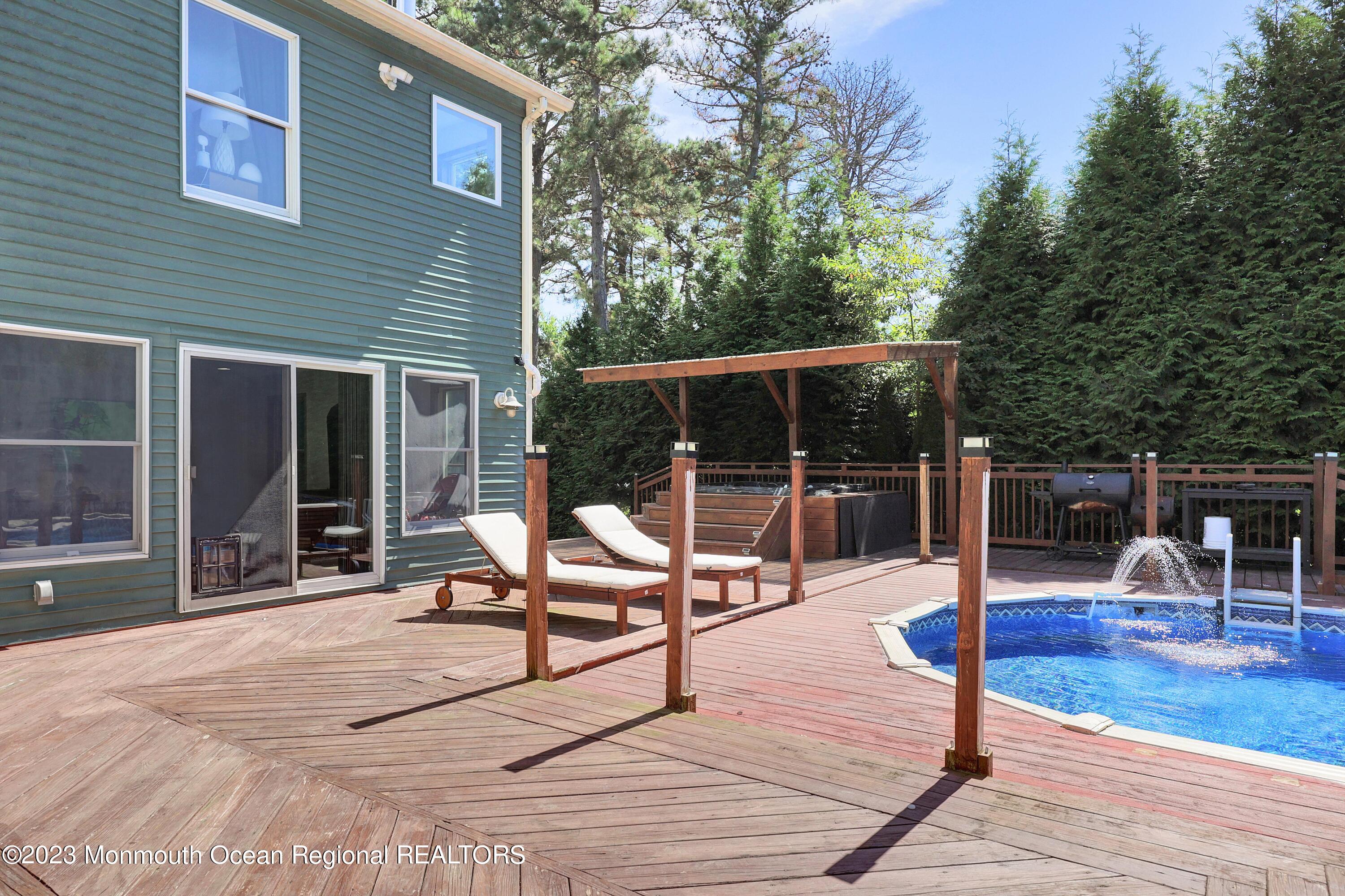 2450 Capshaw Road Forked River, NJ 08731 - Photo 1 of 37 a outdoor view with a sitting space
