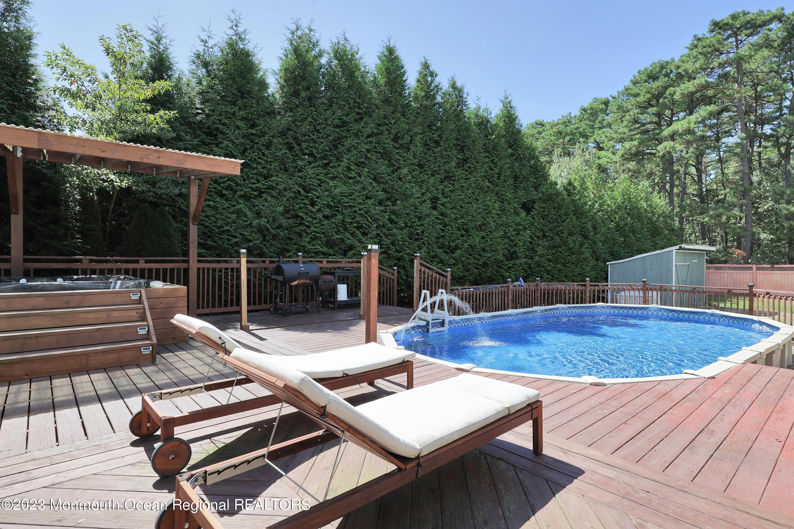 2450 Capshaw Road Forked River, NJ 08731 - Photo 2 of 37 a view of a backyard with sitting area