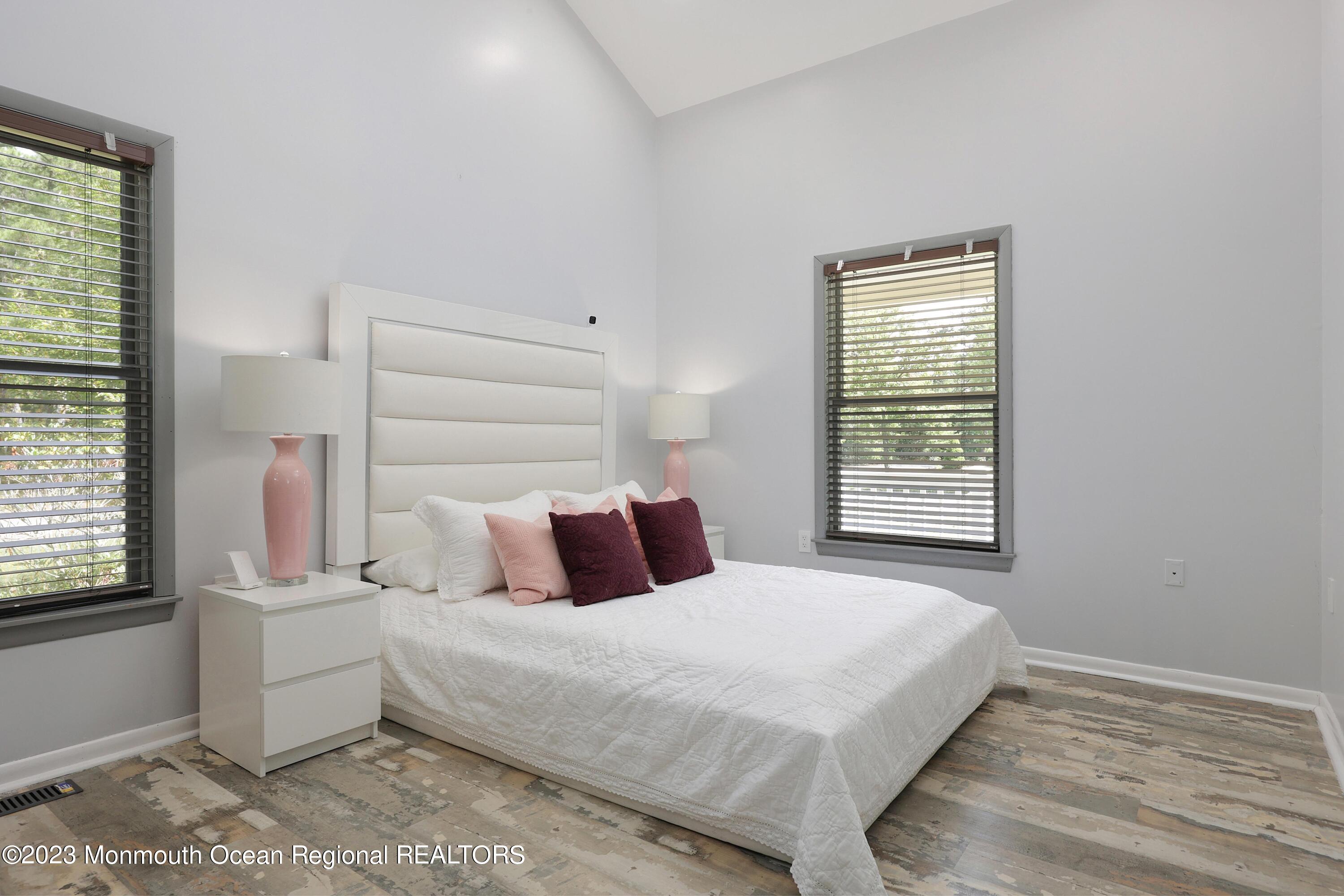 2450 Capshaw Road Forked River, NJ 08731 - Photo 24 of 37 a bedroom with a bed and window
