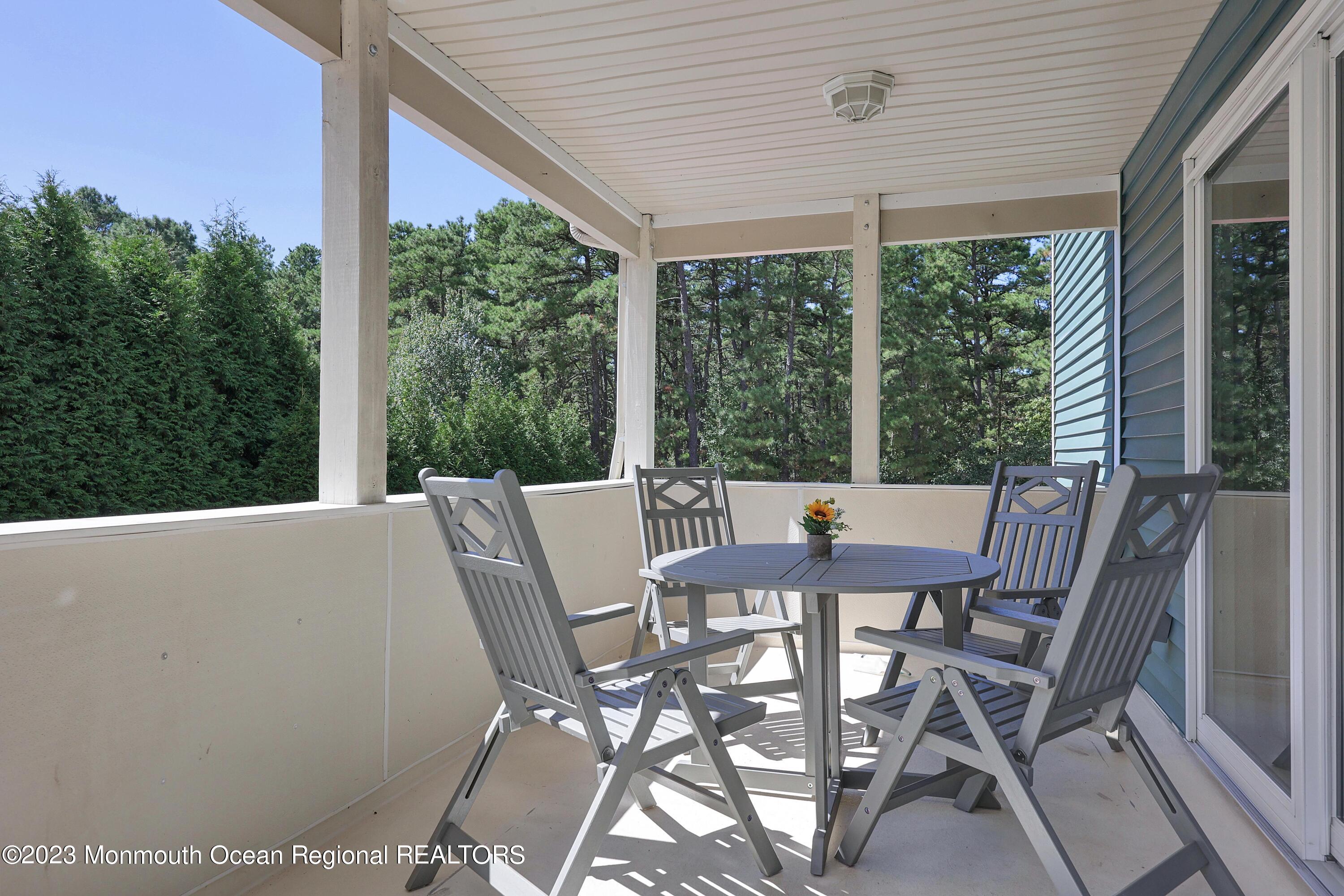 2450 Capshaw Road Forked River, NJ 08731 - Photo 30 of 37 a view of a patio with table and chairs
