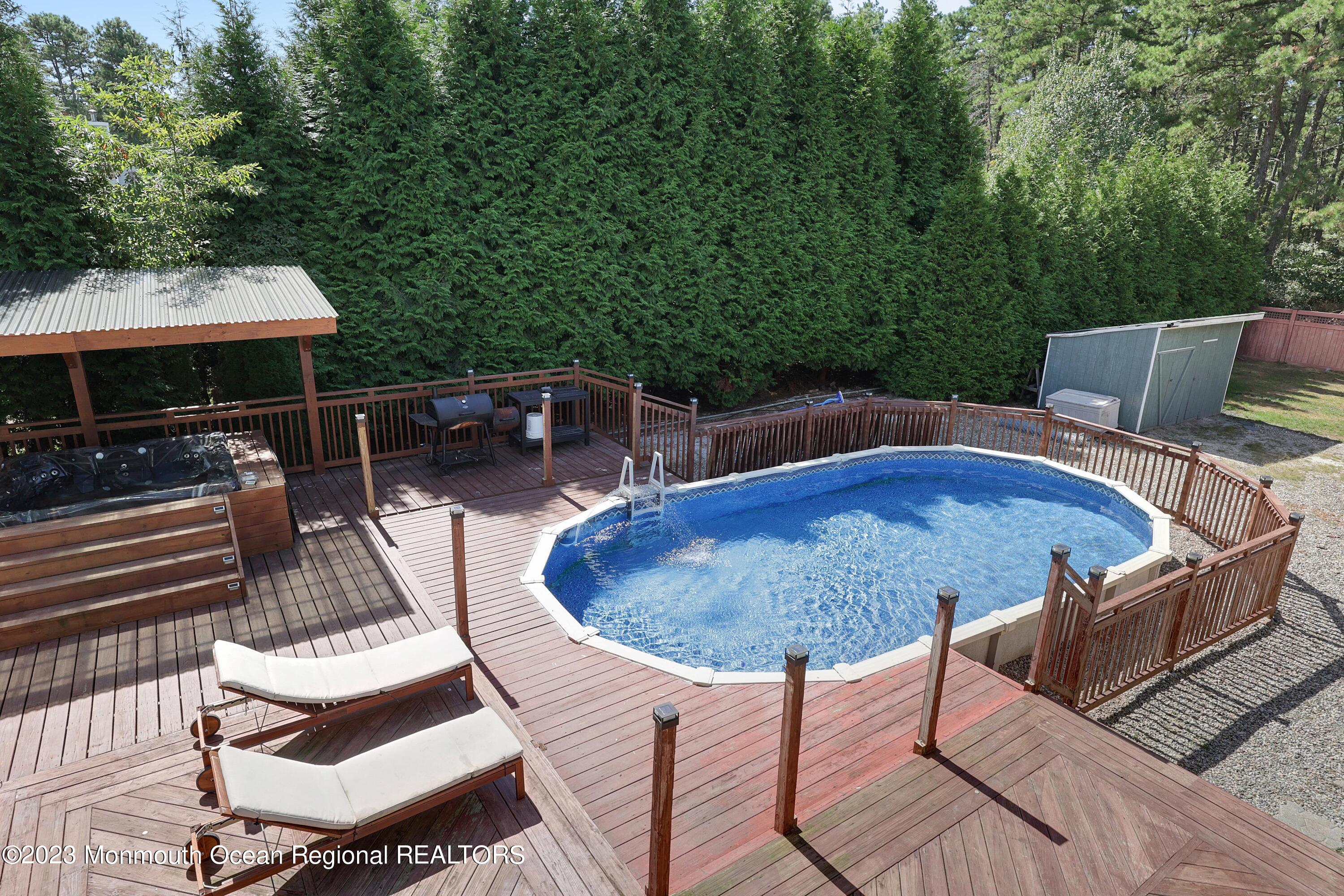 2450 Capshaw Road Forked River, NJ 08731 - Photo 31 of 37 a view of backyard with seating space