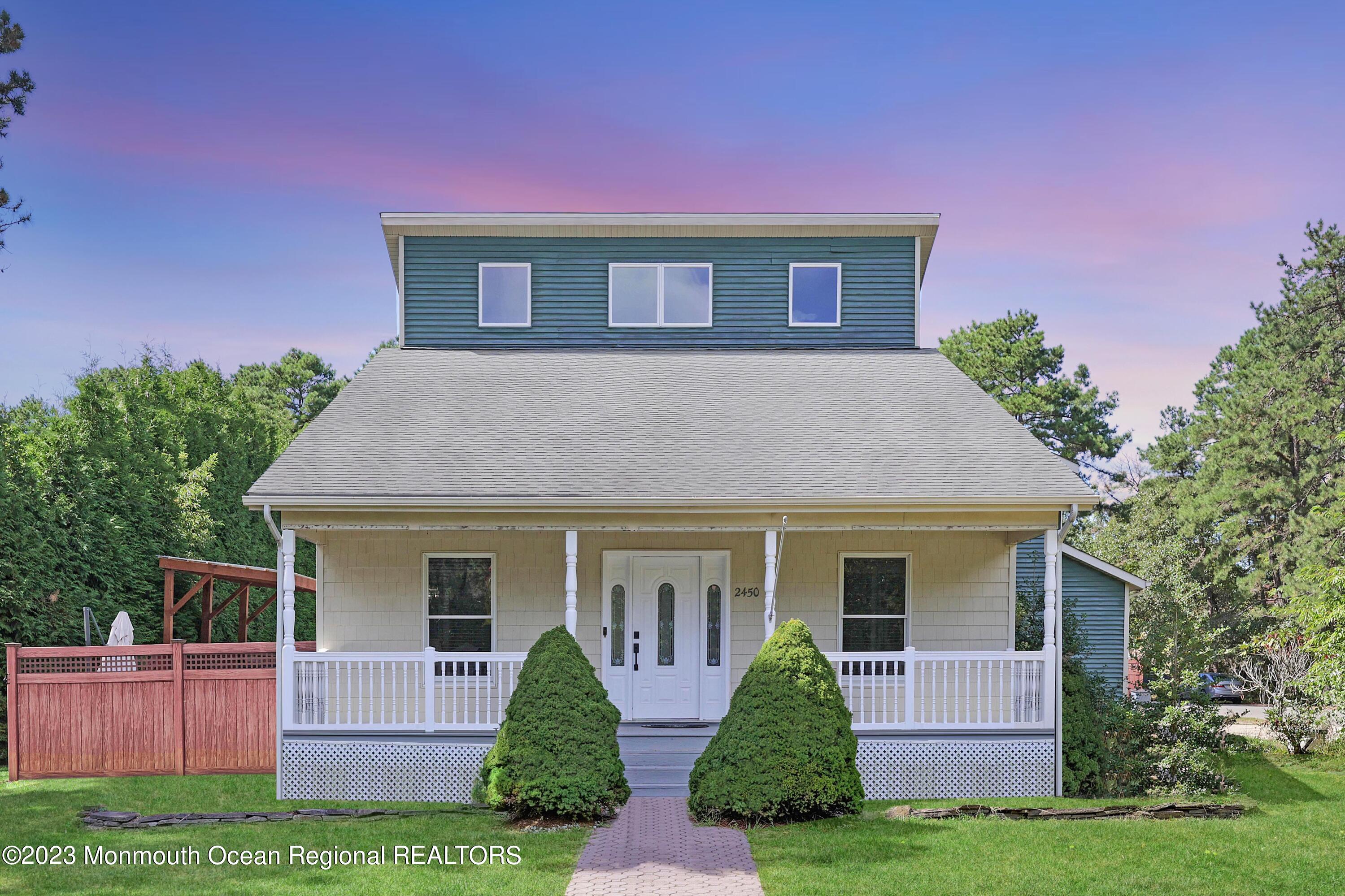 2450 Capshaw Road Forked River, NJ 08731 - Photo 7 of 37 a front view of a house with garden