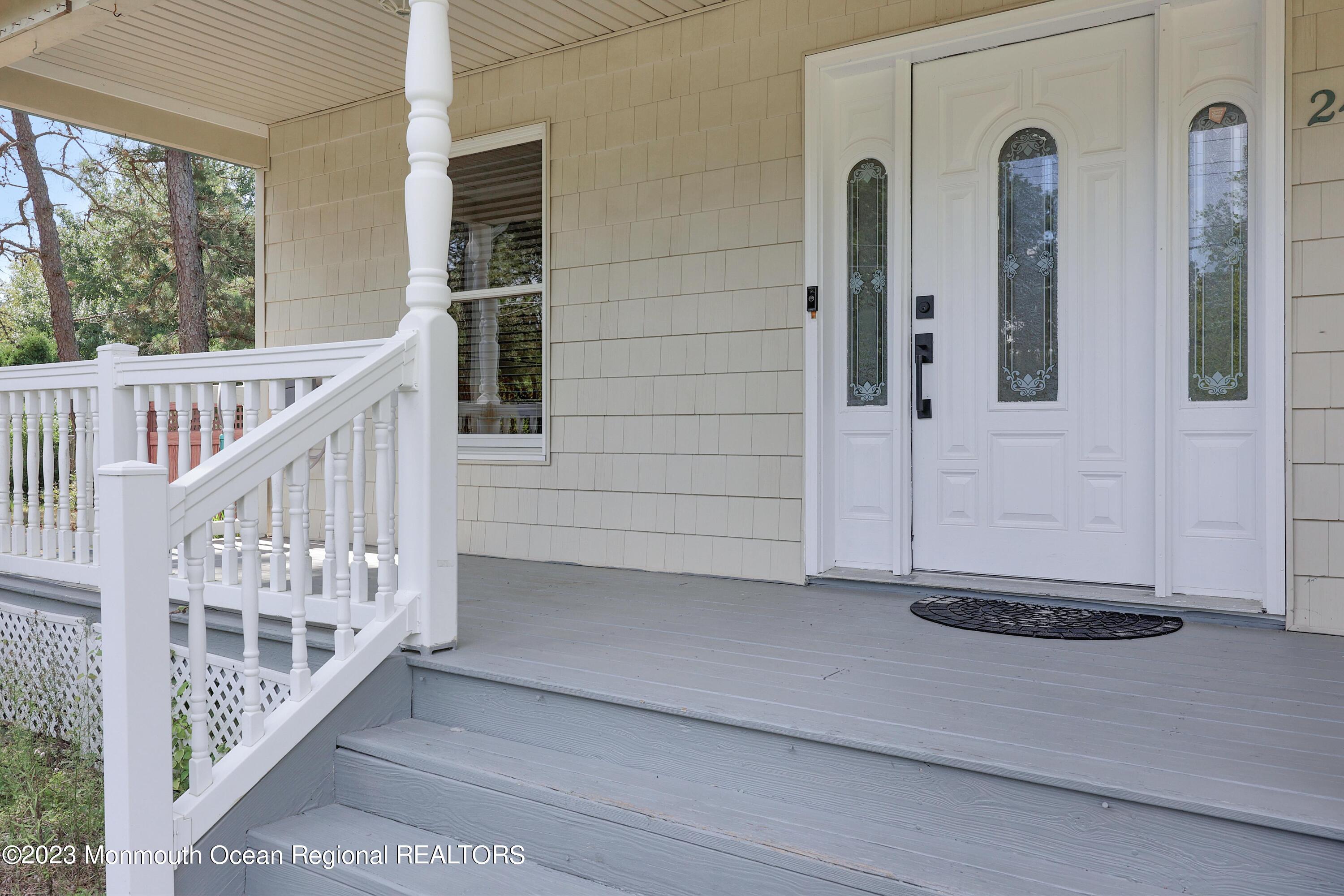2450 Capshaw Road Forked River, NJ 08731 - Photo 8 of 37 a view of a entryway door of the house