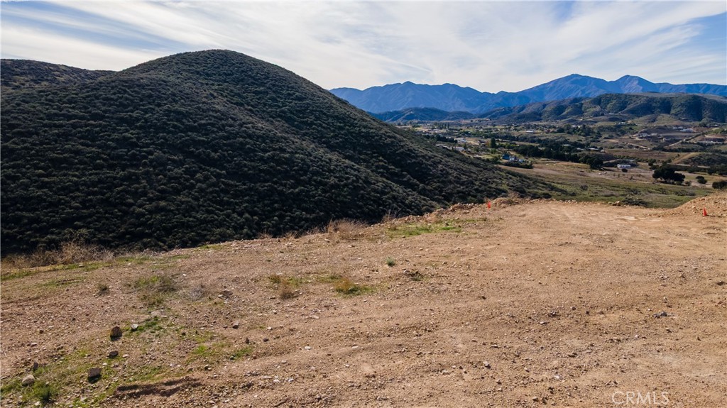 0 Rocky Bluff Road Perris, CA 92570 - Photo 30 of 46 a view of a dry yard with mountains in the background