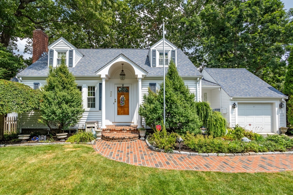 32 Melvin Road Arlington, MA 02474 - Photo 1 of 39 a front view of a house with a yard