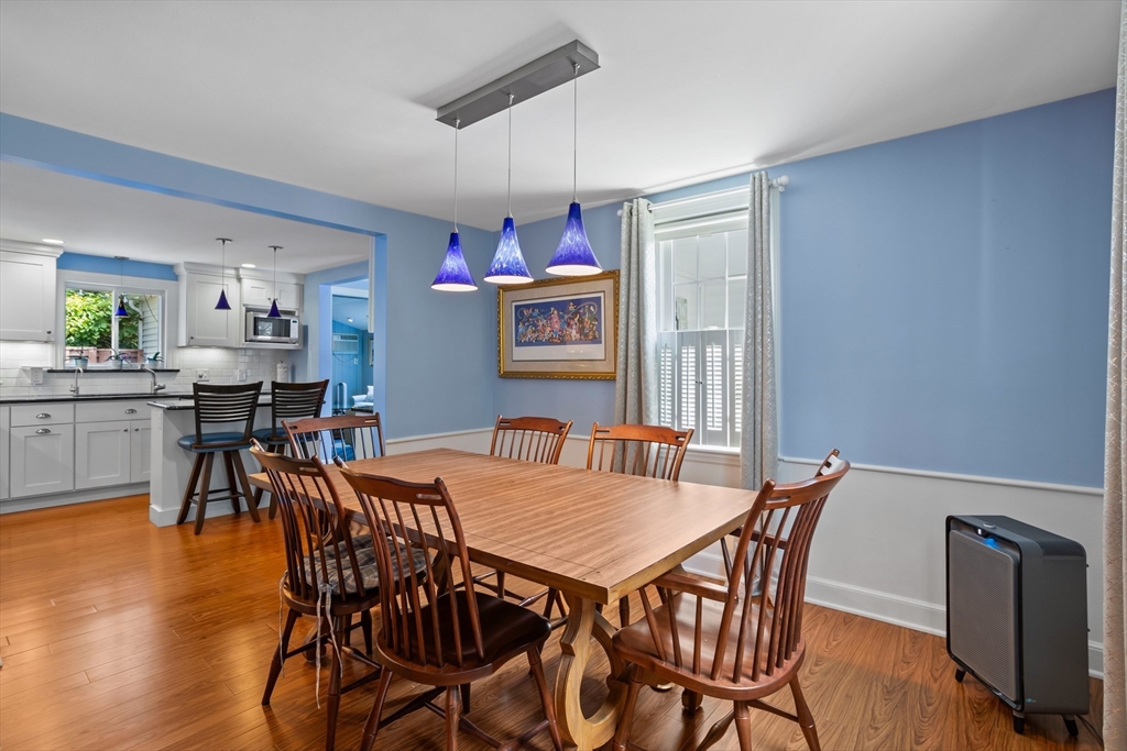 32 Melvin Road Arlington, MA 02474 - Photo 12 of 39 a view of a dining room with furniture and wooden floor
