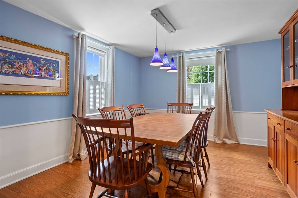 32 Melvin Road Arlington, MA 02474 - Photo 14 of 39 a view of a dining room with furniture window and wooden floor