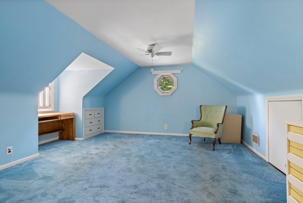 32 Melvin Road Arlington, MA 02474 - Photo 21 of 39 a view of a livingroom with furniture and a ceiling fan