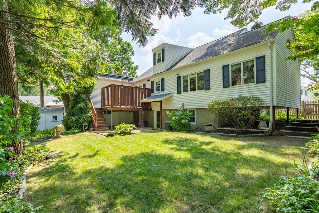 32 Melvin Road Arlington, MA 02474 - Photo 28 of 39 a view of a house with pool and sitting area