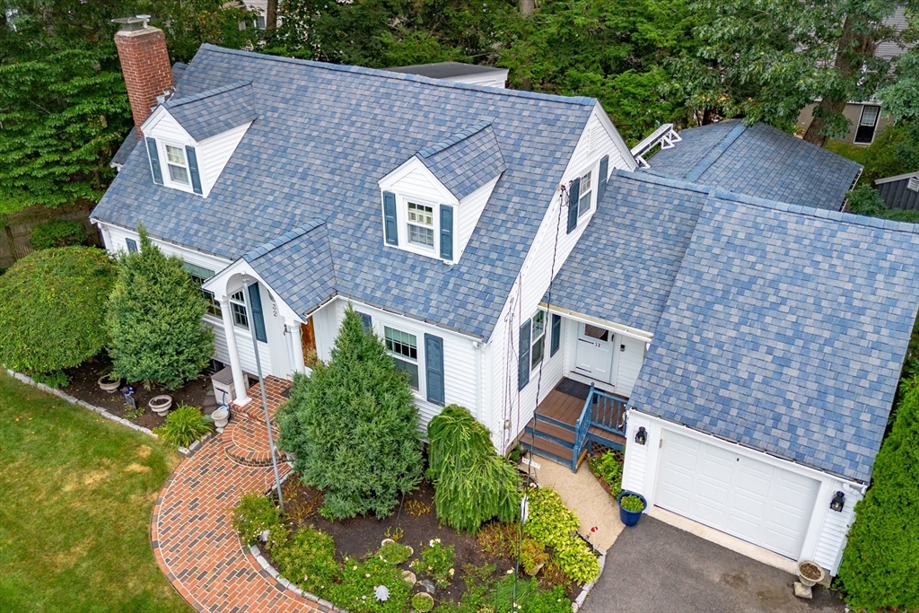 32 Melvin Road Arlington, MA 02474 - Photo 32 of 39 an aerial view of a house with a yard
