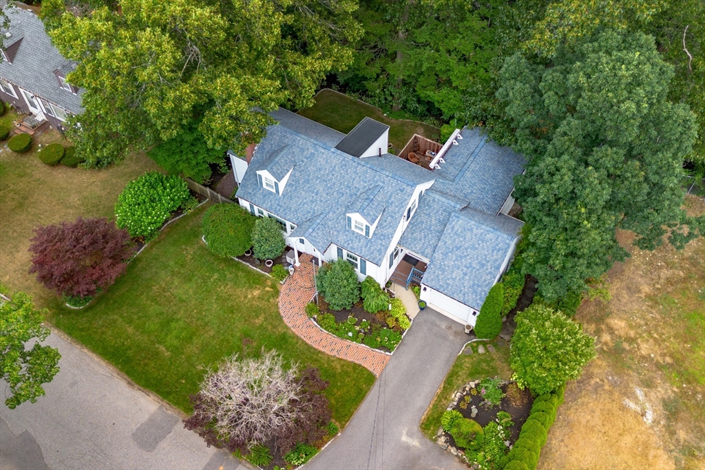 32 Melvin Road Arlington, MA 02474 - Photo 33 of 39 an aerial view of a house with a garden