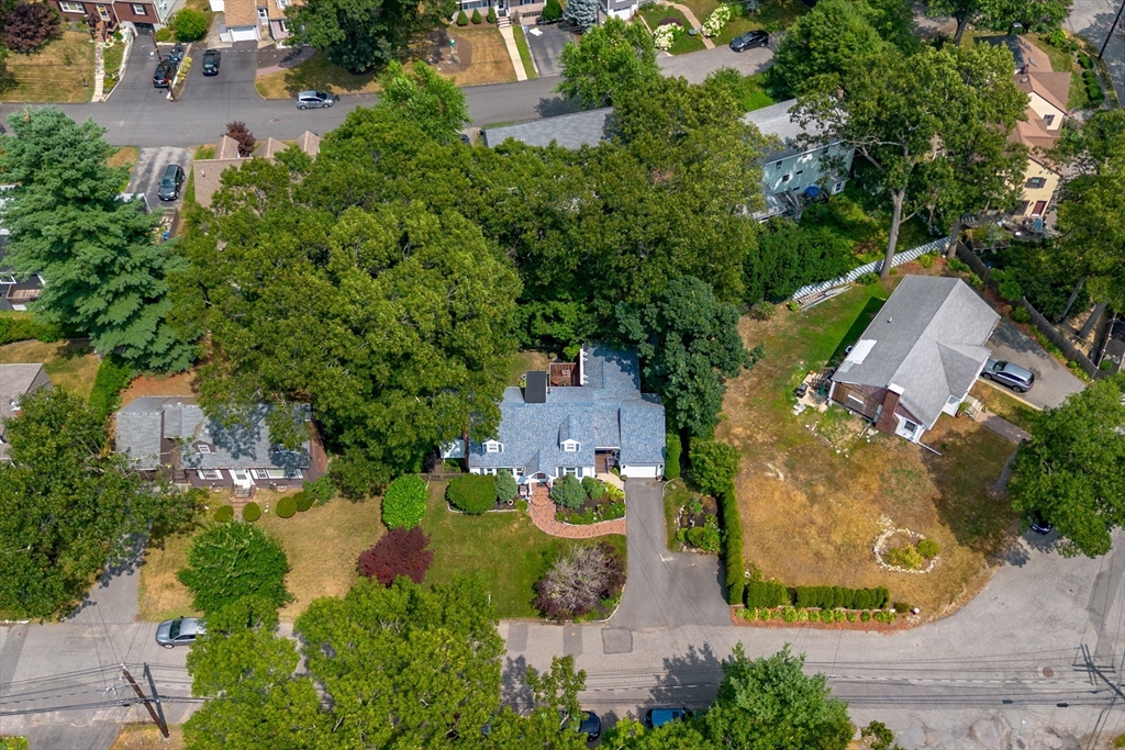 32 Melvin Road Arlington, MA 02474 - Photo 34 of 39 an aerial view of a house with yard swimming pool and outdoor seating
