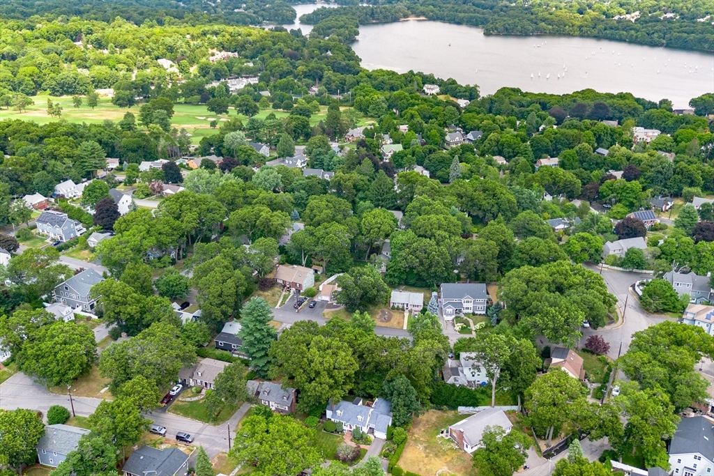 32 Melvin Road Arlington, MA 02474 - Photo 35 of 39 a view of a lake with a house in the background