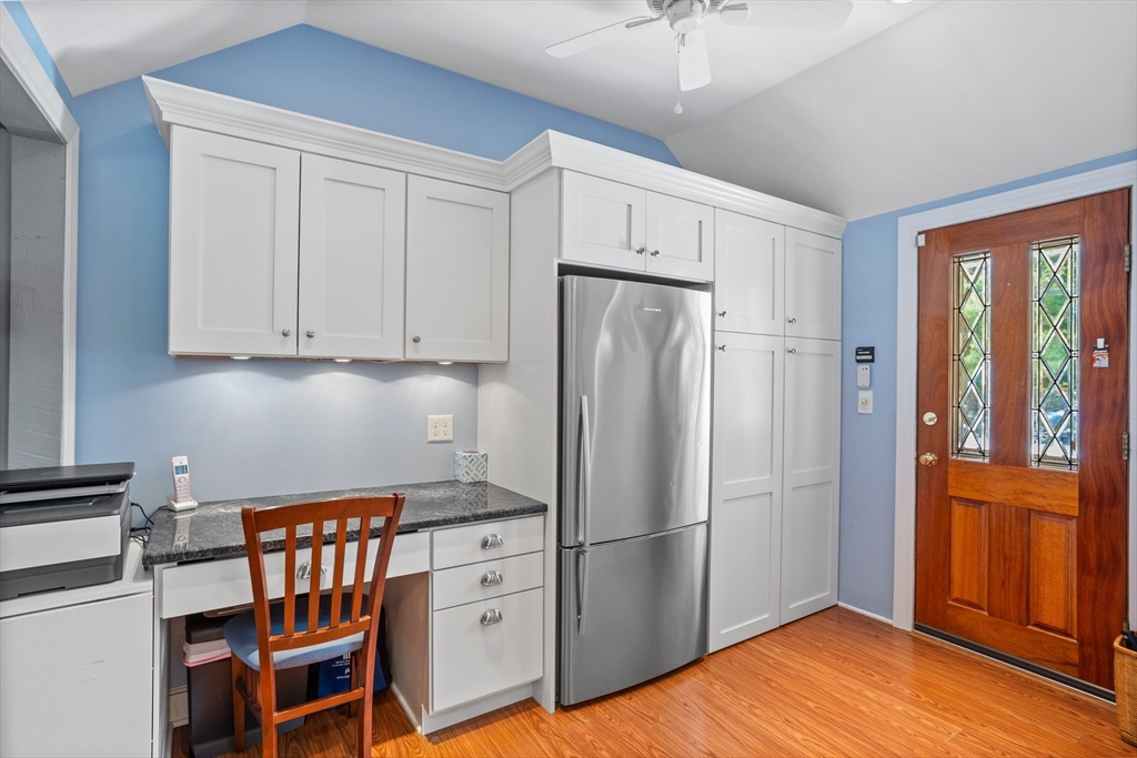 32 Melvin Road Arlington, MA 02474 - Photo 8 of 39 a kitchen with stainless steel appliances granite countertop a refrigerator and a stove top oven