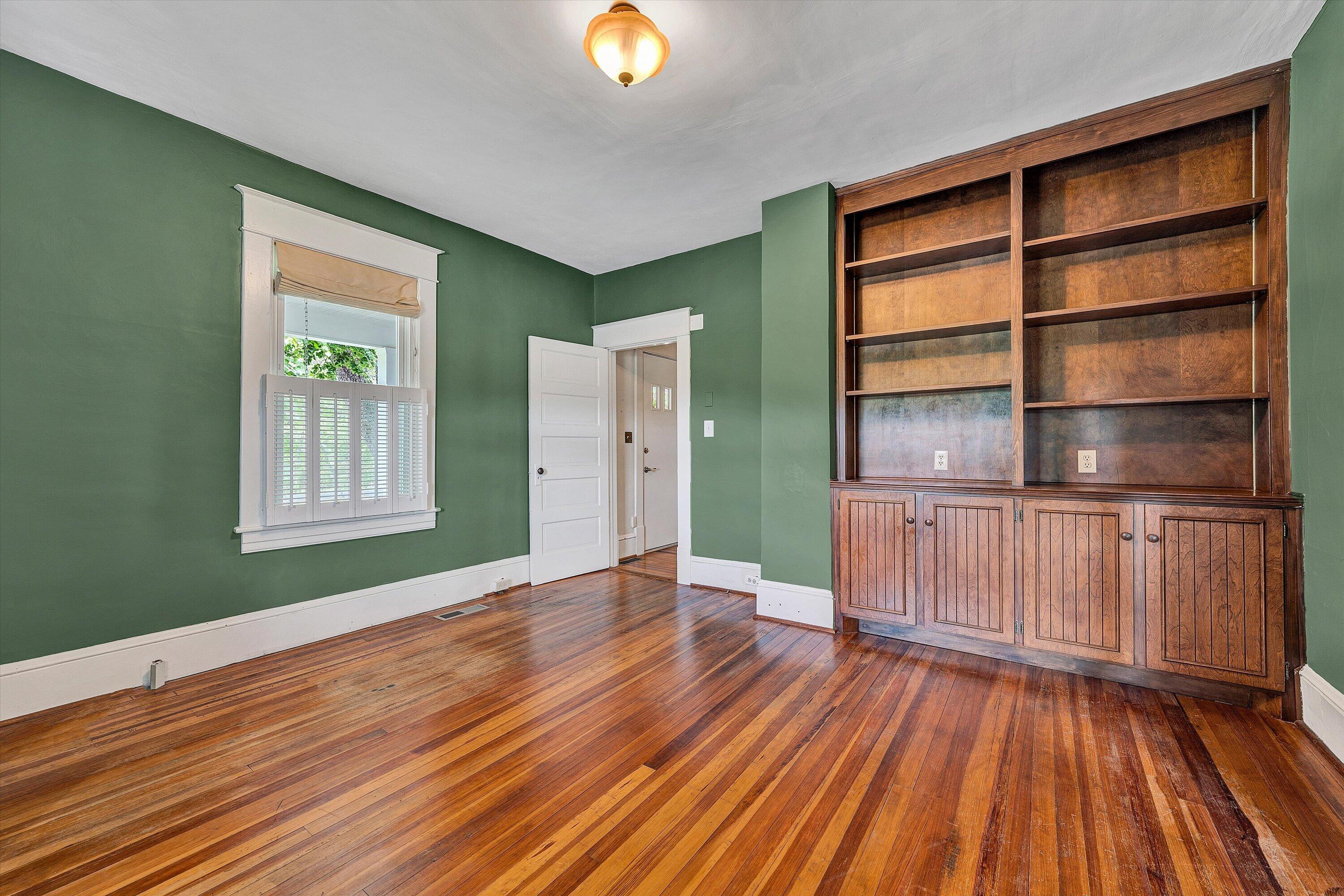 341 Springwood Road Fincastle, VA 24090 - Photo 26 of 55 a view of an empty room with window and wooden floor