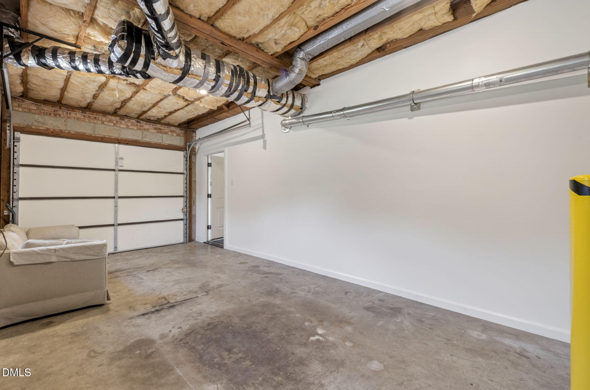 1224 Pineview Drive Raleigh, NC 27606 - Photo 34 of 45 a view of a room with racks on the wall
