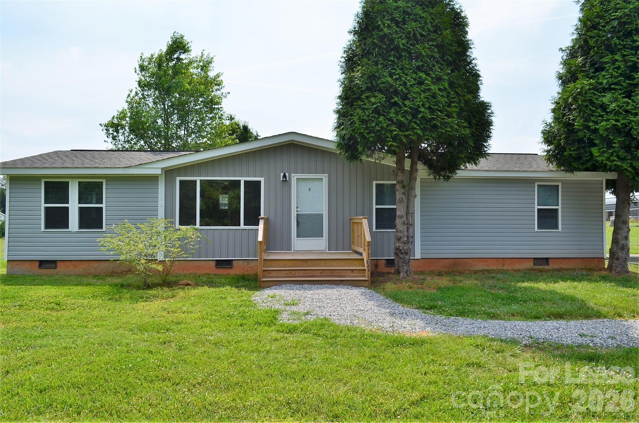 7167 Long Island Road Catawba, NC 28609 - Photo 1 of 34 a front view of house with yard and green space