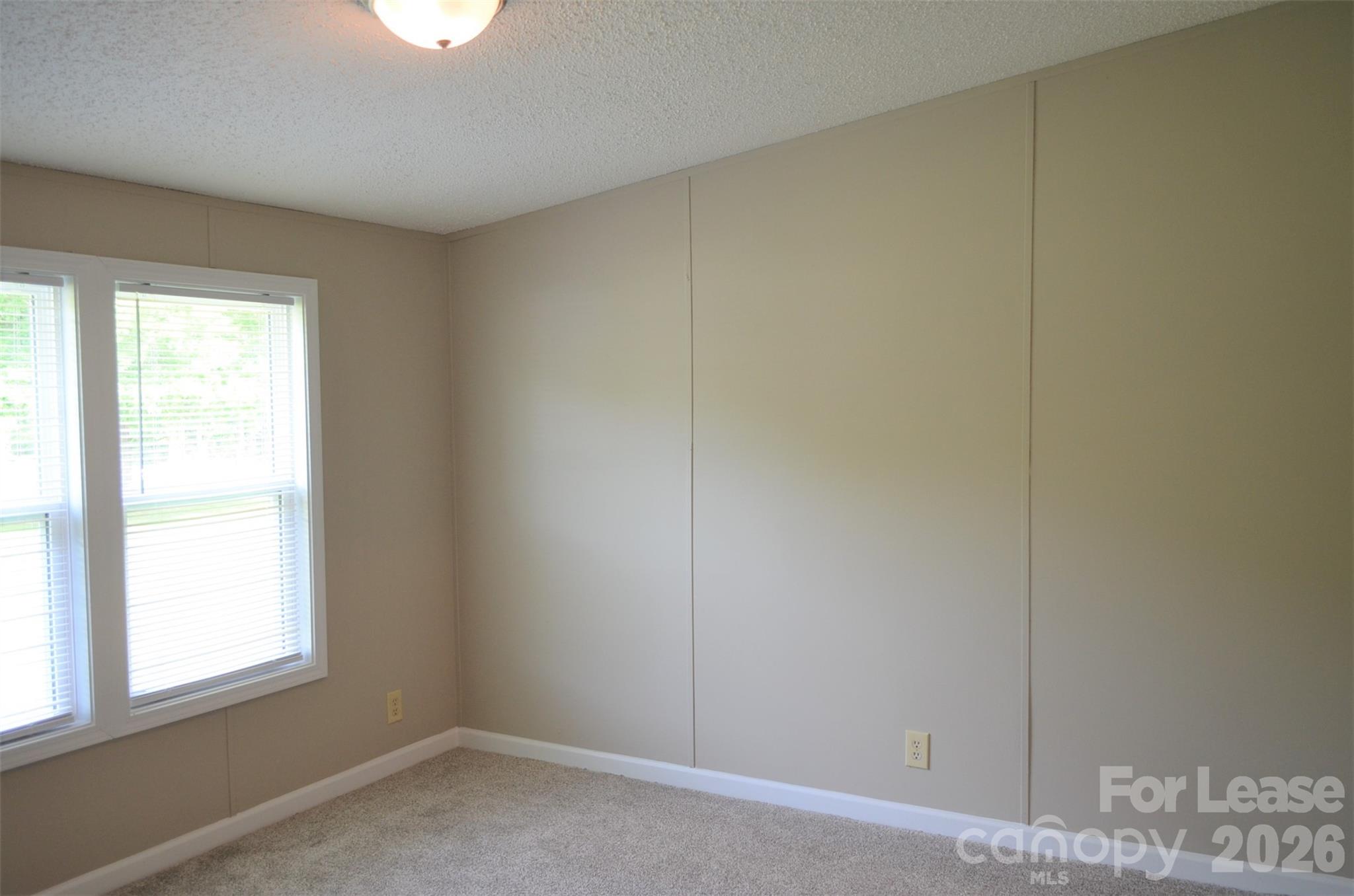 7167 Long Island Road Catawba, NC 28609 - Photo 19 of 34 an empty room with a window