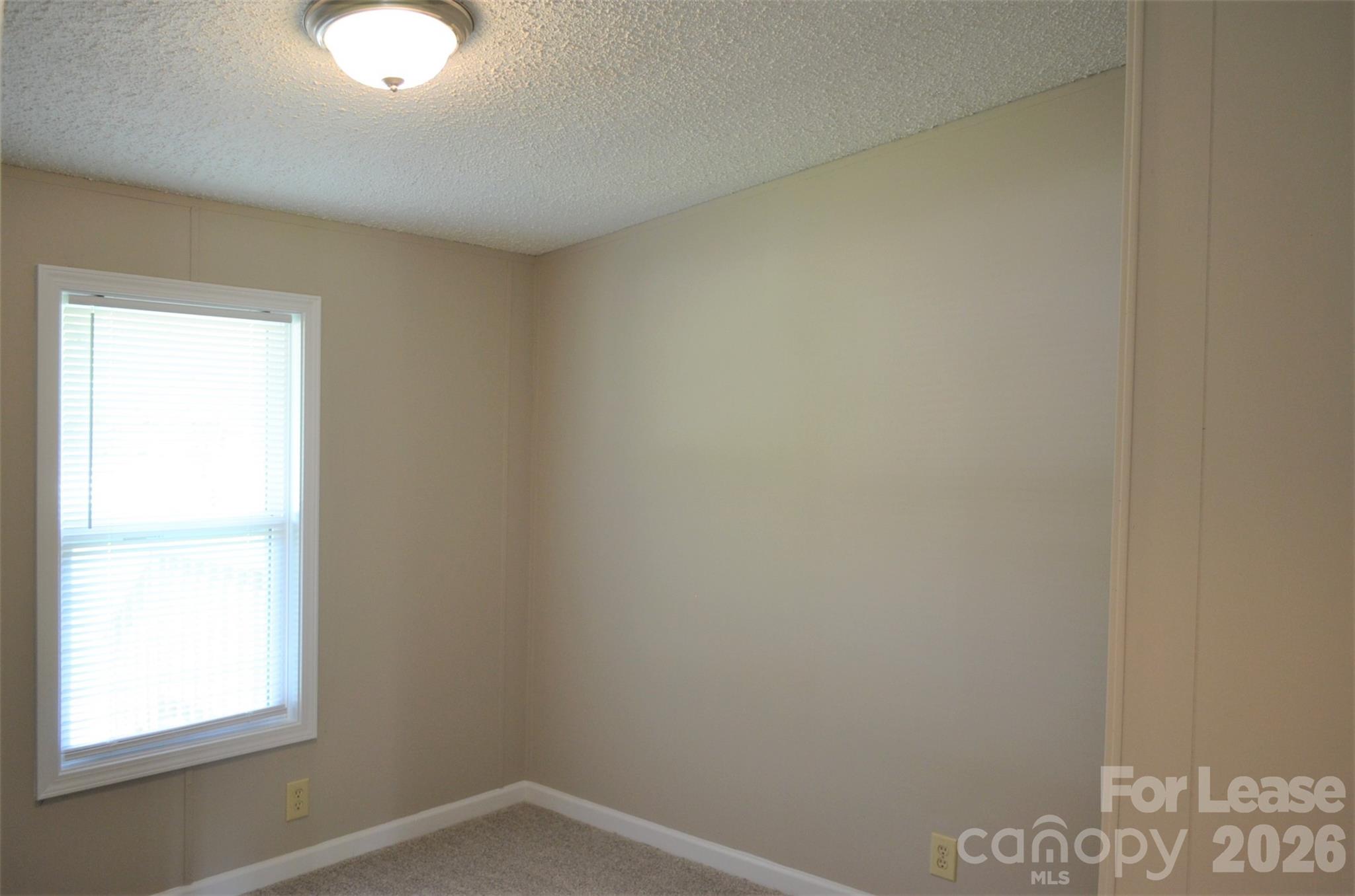 7167 Long Island Road Catawba, NC 28609 - Photo 26 of 34 an empty room with windows