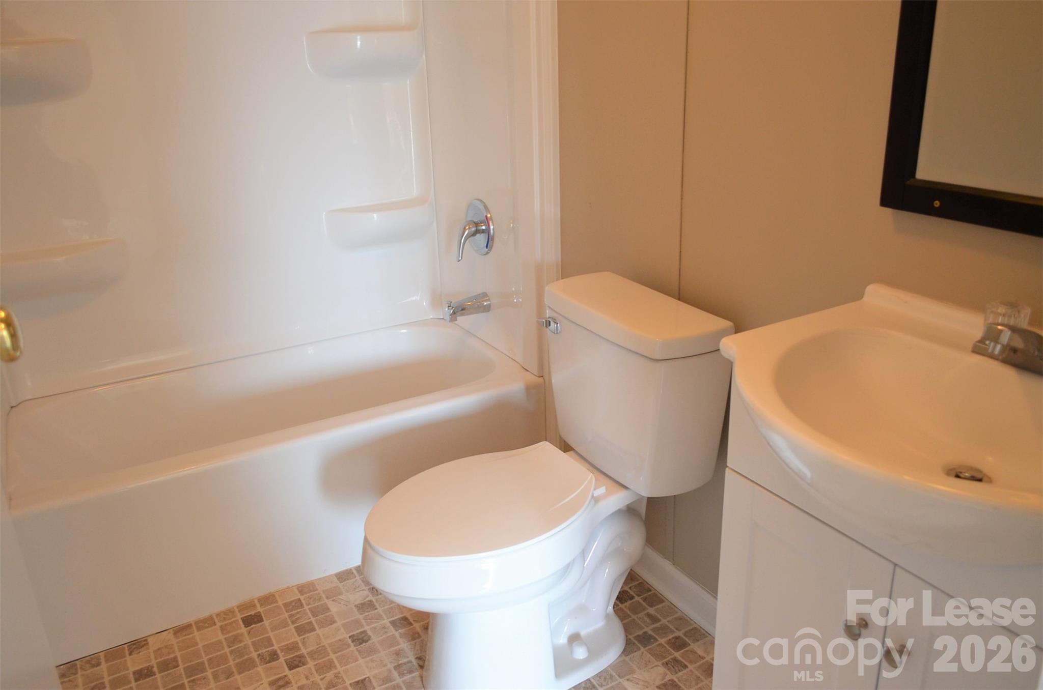 7167 Long Island Road Catawba, NC 28609 - Photo 27 of 34 a white toilet sitting next to a bath tub