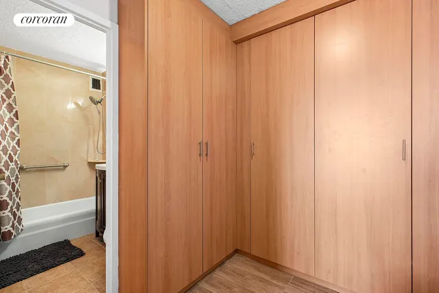 a view of a bathroom with a shower curtain