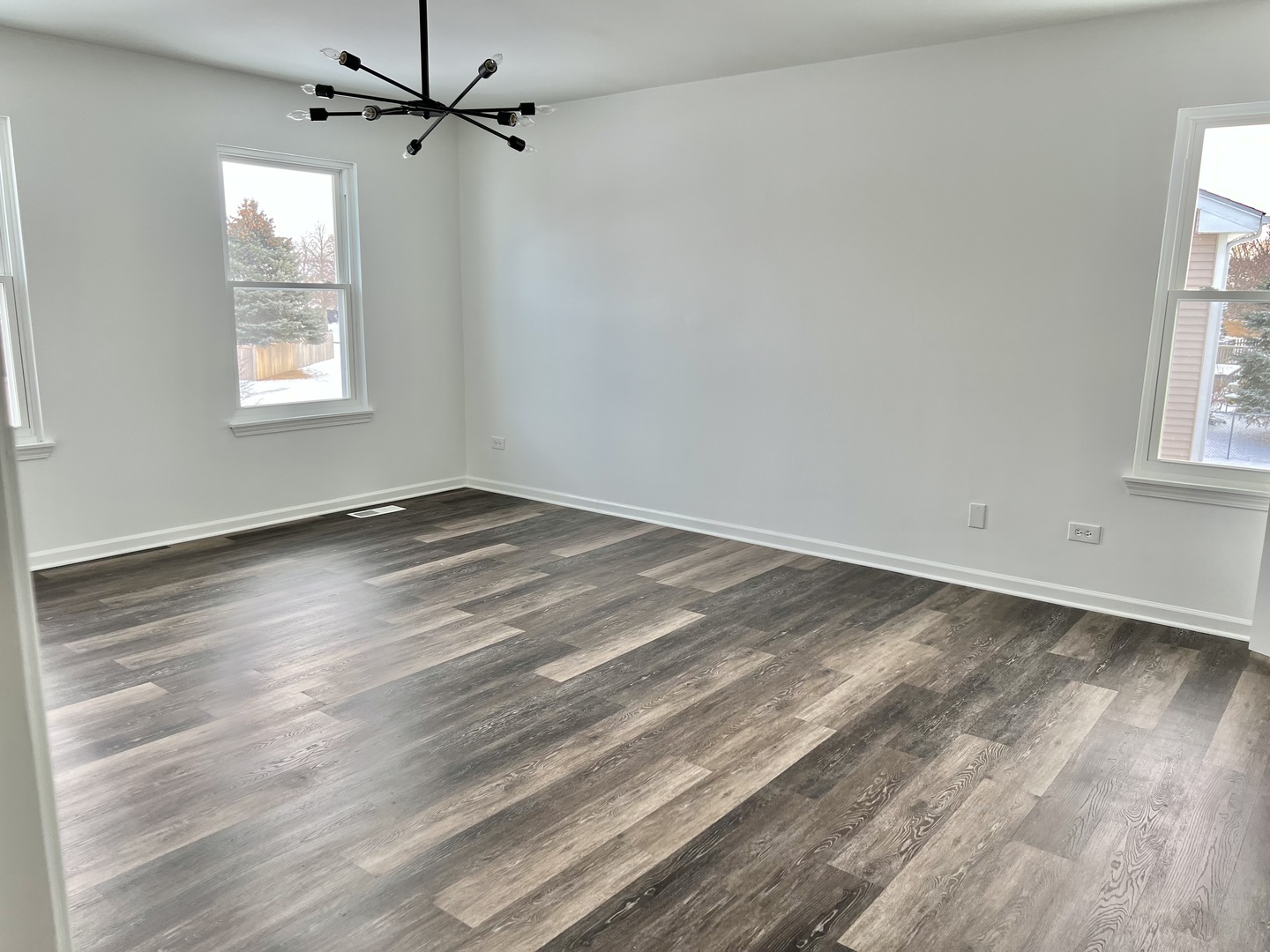 621 Buckboard Road Bolingbrook, IL 60490 - Photo 27 of 38 wooden floor in an empty room with a window
