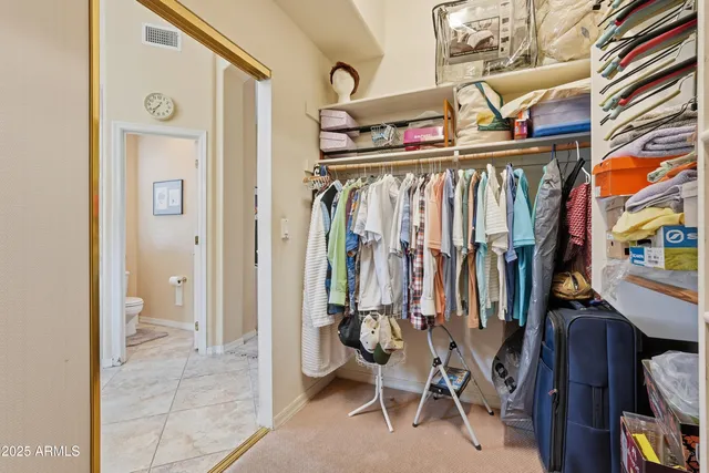 a view of room with closet and cabinet
