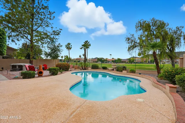 an aerial view of a house with a garden