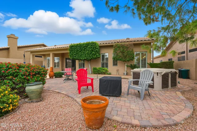 an aerial view of a house with outdoor space and street view