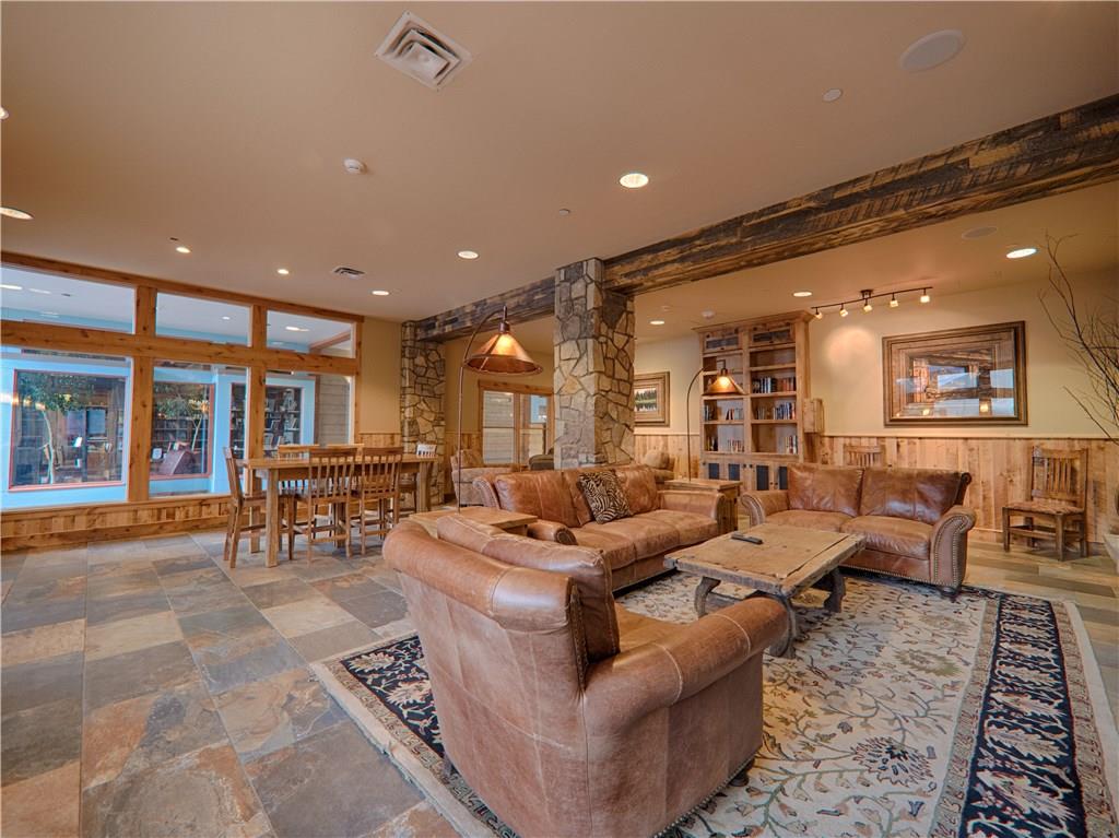129 River Run Road, Unit 8064 Keystone, CO 80435 - Photo 11 of 21 a living room with furniture and a large window