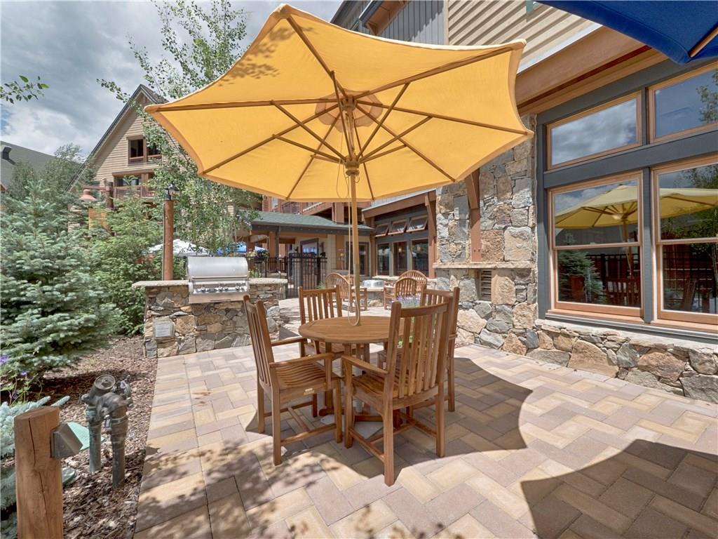 129 River Run Road, Unit 8064 Keystone, CO 80435 - Photo 16 of 21 a patio with a table and chairs