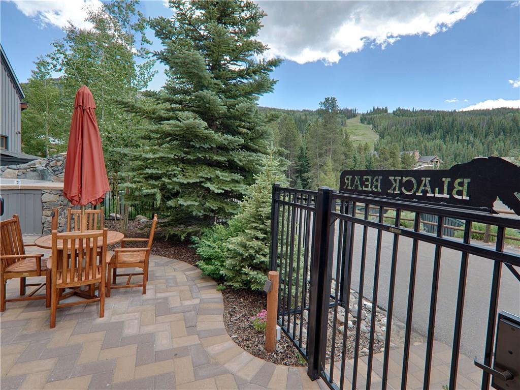 129 River Run Road, Unit 8064 Keystone, CO 80435 - Photo 17 of 21 a view of a chairs and table in the roof deck