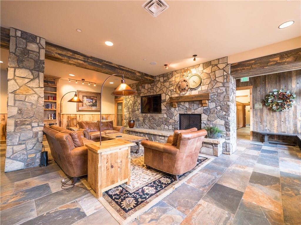 129 River Run Road, Unit 8064 Keystone, CO 80435 - Photo 18 of 21 a living room with fireplace furniture and a fireplace