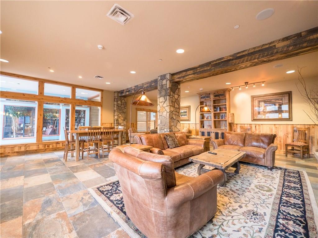 129 River Run Road, Unit 8064 Keystone, CO 80435 - Photo 19 of 21 a living room with furniture and a large window