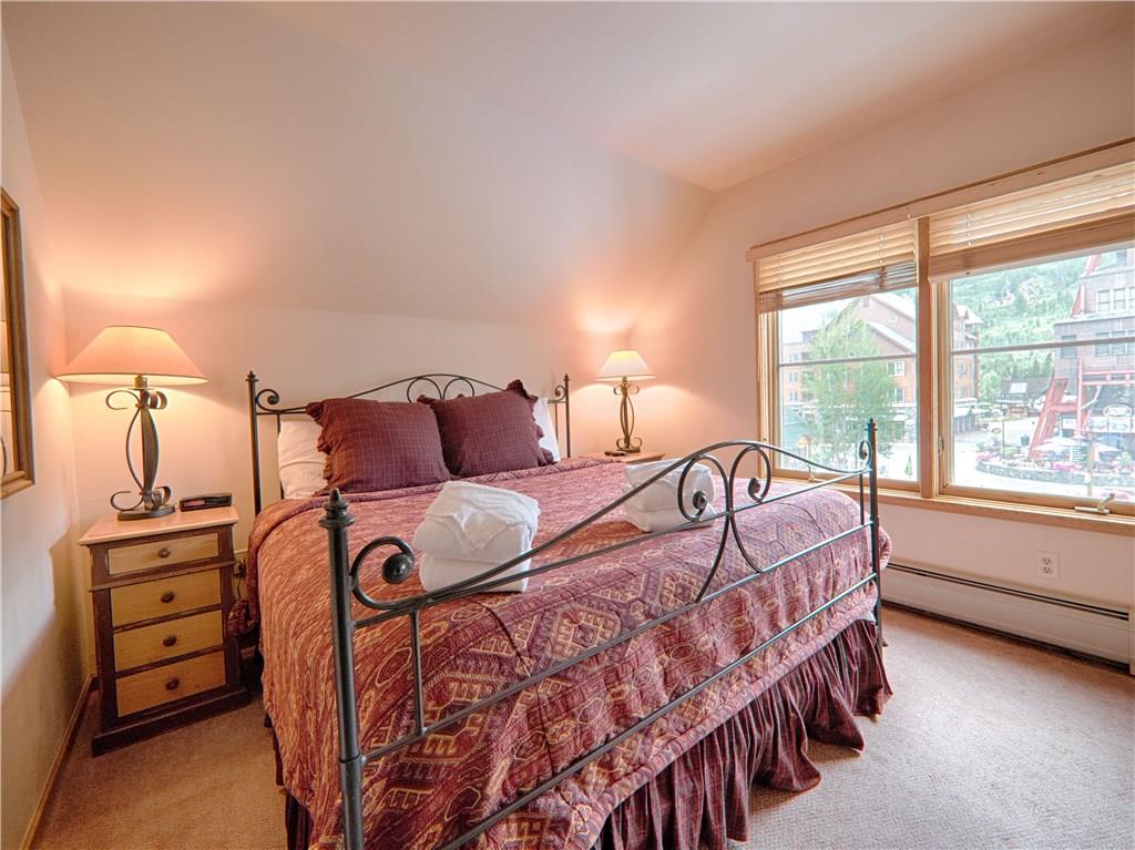 129 River Run Road, Unit 8064 Keystone, CO 80435 - Photo 9 of 21 a bedroom with a bed and with furniture