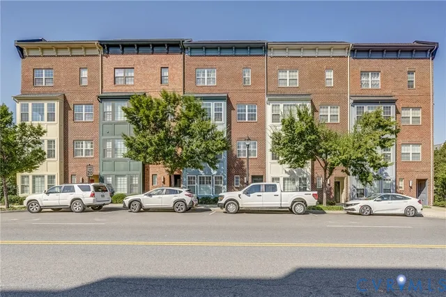 a building in front of a brick building